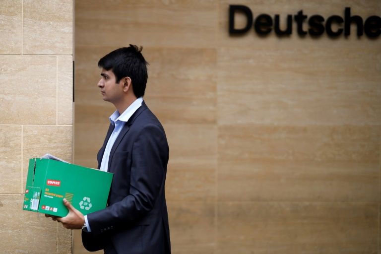 Dismissed Deutsche Bank staff head out as overhaul bites